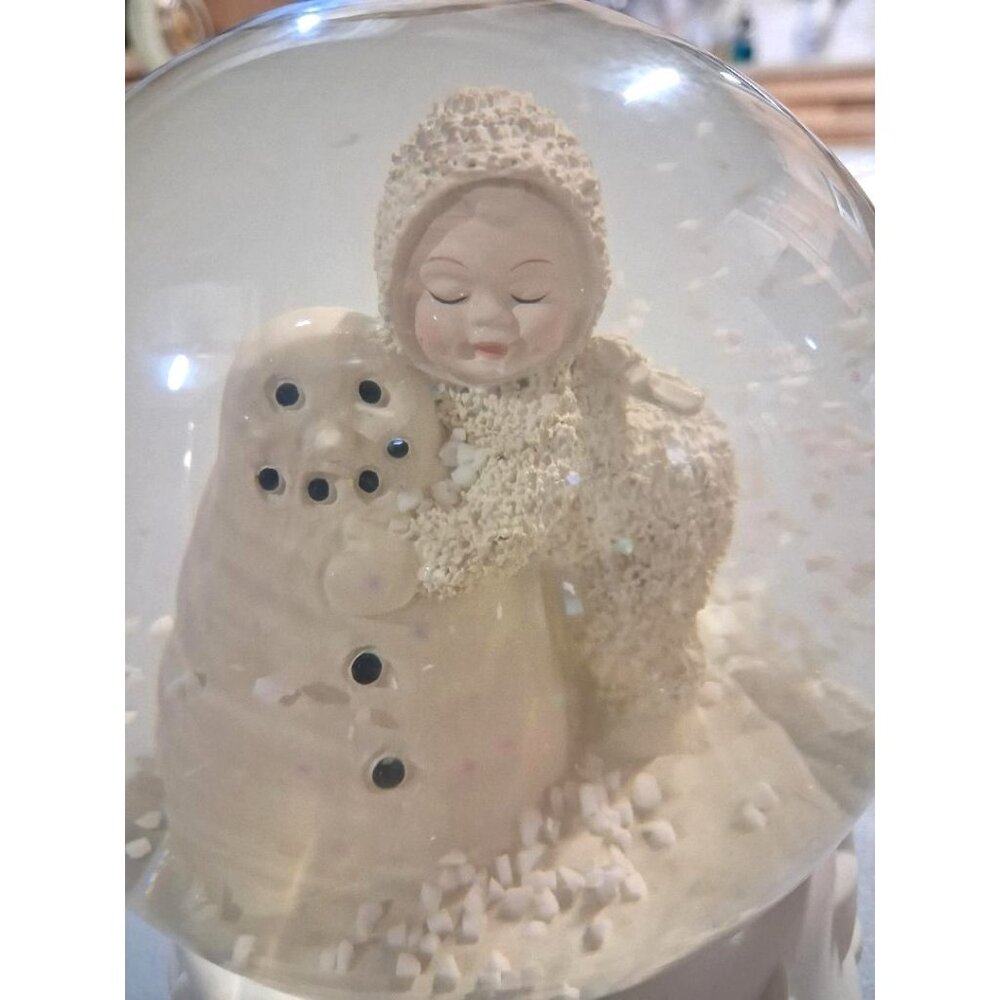 Snow Globe With Child & Snowman Figurine On White Star-Patterned Base Dept 56 Mu